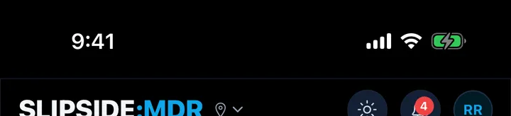 The header bar with the wordmark, harbor pin, theme toggle, bell and avatar